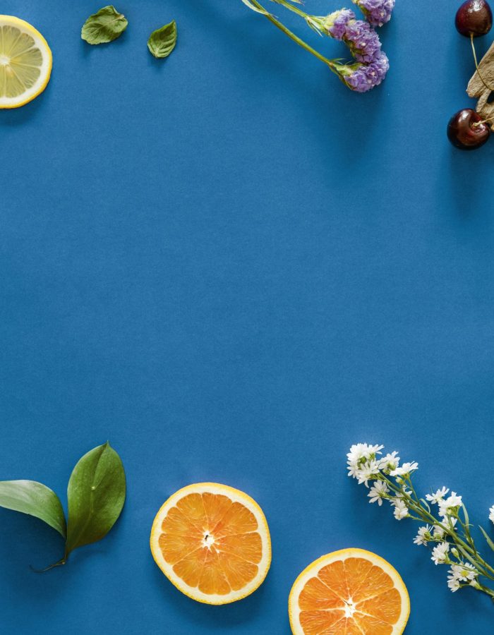 Assortment of tropical citrus fruits background
